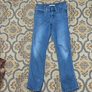 Levi’s 312 shaping slim blue jeans